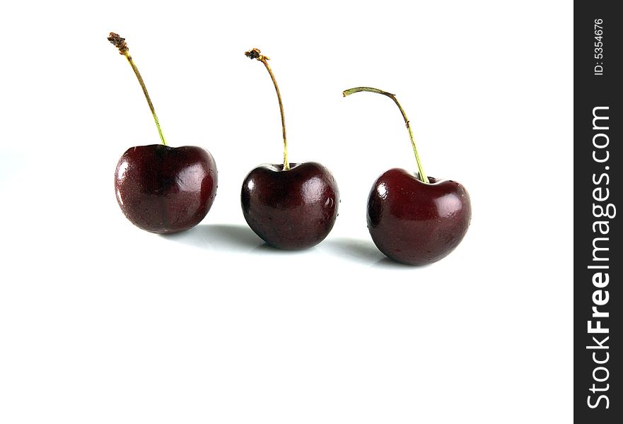 Close up of three cherries