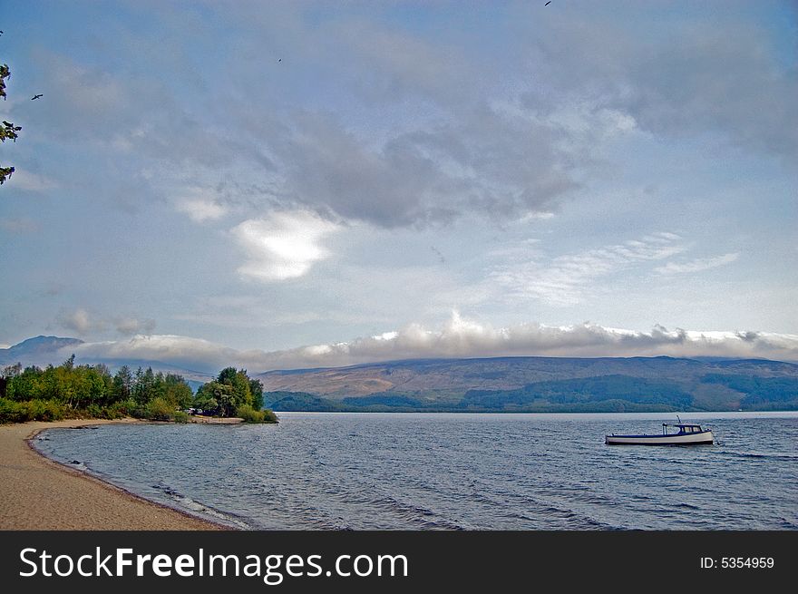 By the loch at luss loch lomond trossachs national park scotland united kingdom. By the loch at luss loch lomond trossachs national park scotland united kingdom