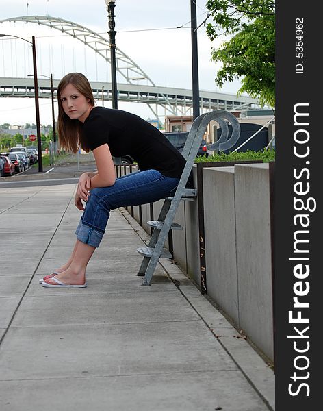 Teen Sitting On Stairs - Vertical