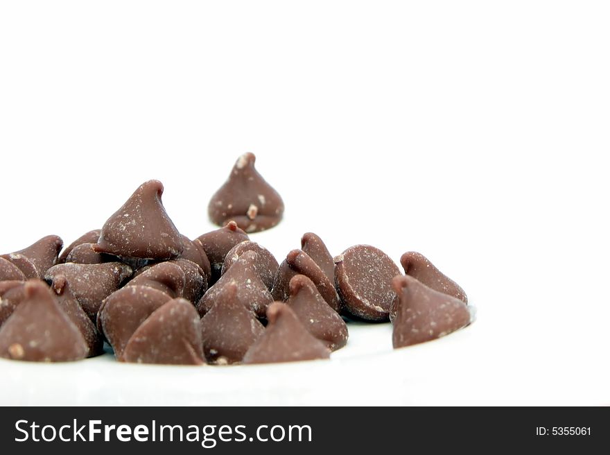 Choc drops isolated on white, landscape with copyspace. Choc drops isolated on white, landscape with copyspace