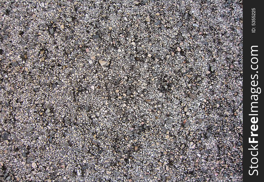 Close up view of asphalt from a road. Close up view of asphalt from a road.