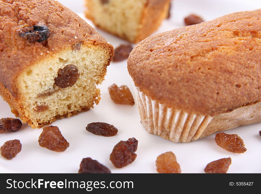 Small rolls with raisins on the white background