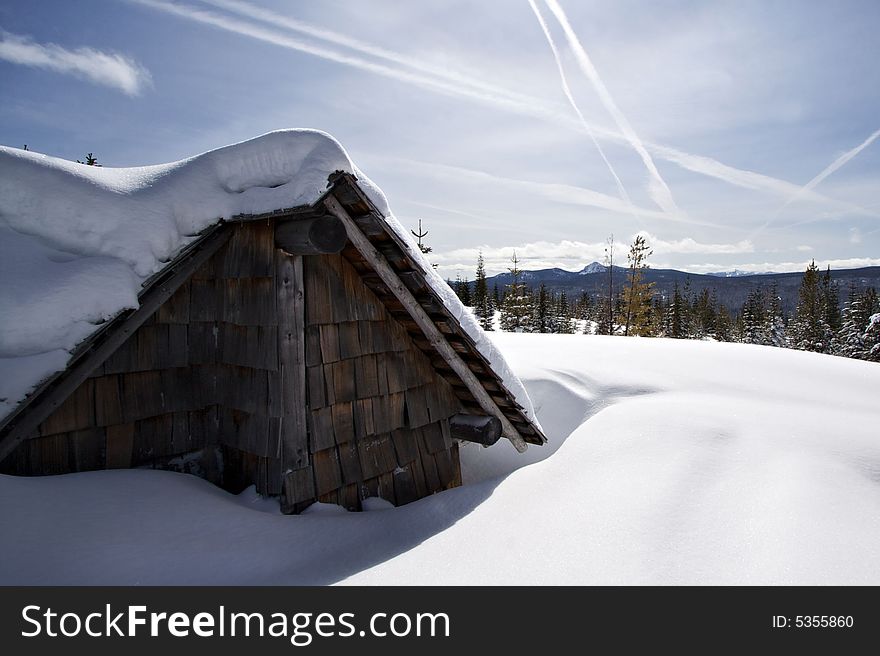 Oregon's Fuji Mountain shelter covered in deep snow. Oregon's Fuji Mountain shelter covered in deep snow