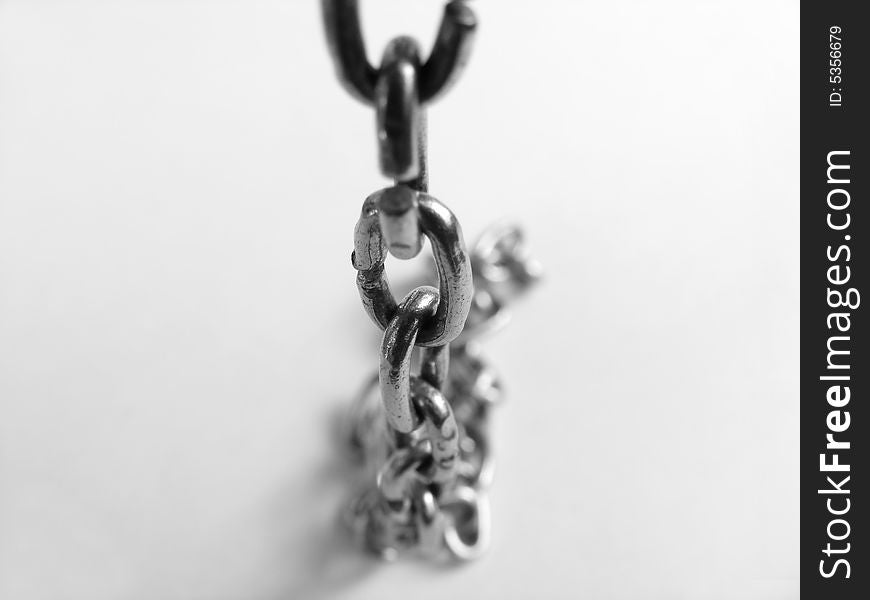 Links of chain on a white background