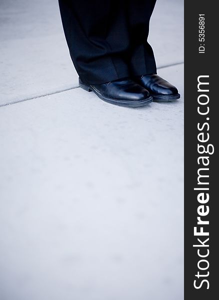 Close view shoes and pants of businessman. Close view shoes and pants of businessman