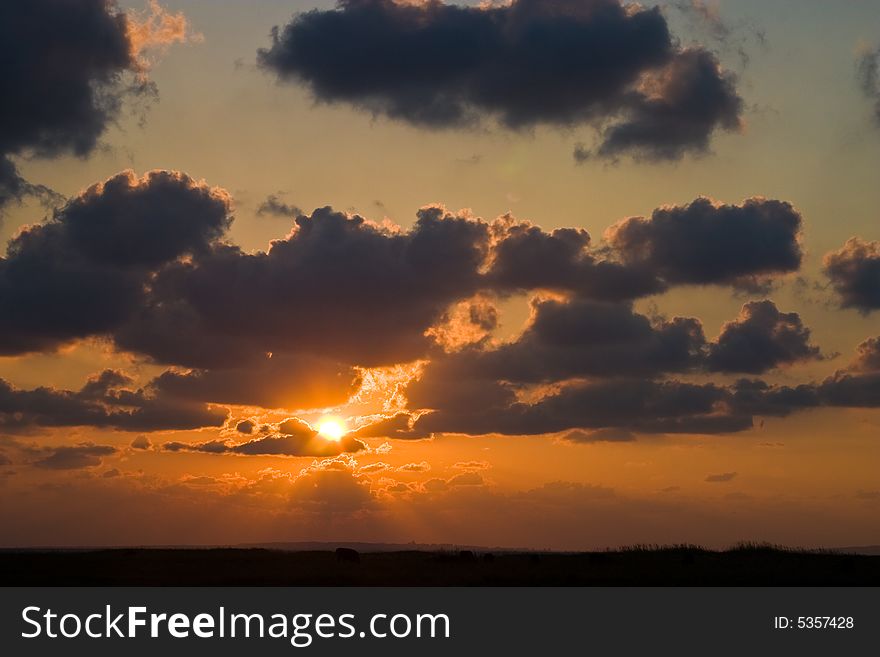 View series: summer evening sunset with cloudy sky
