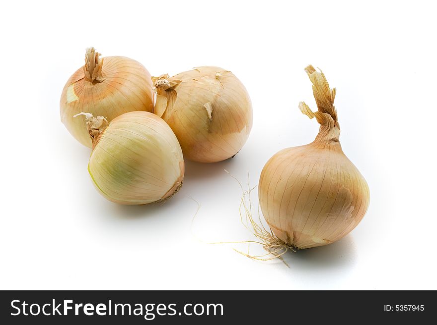 Group of onions isolated on white background