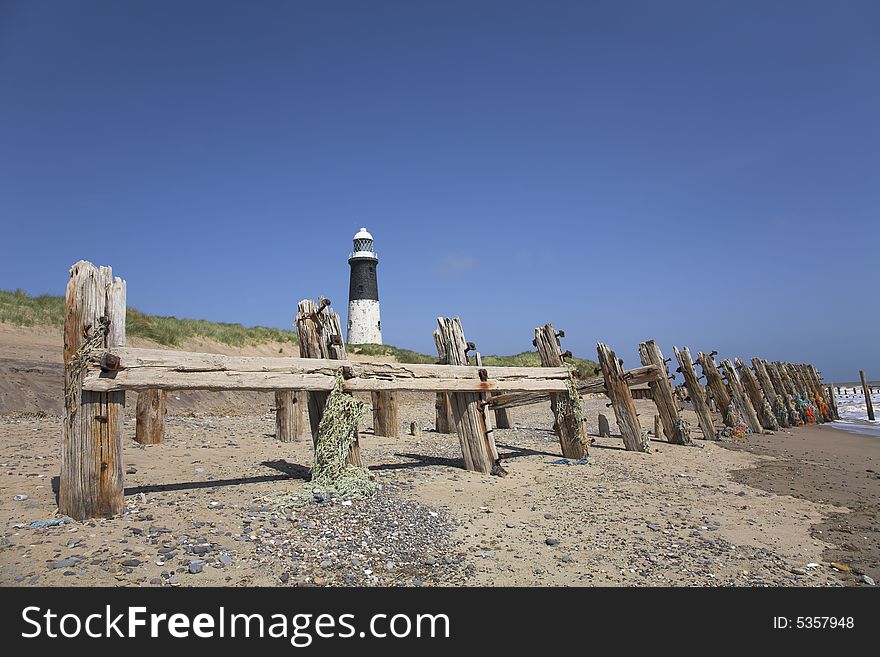 Black and white circular lighthouse at Spurn in East Yorkshire