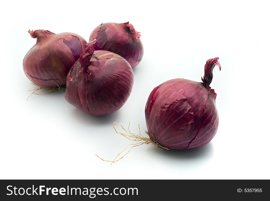 Group of purple onions isolated on white background. Group of purple onions isolated on white background