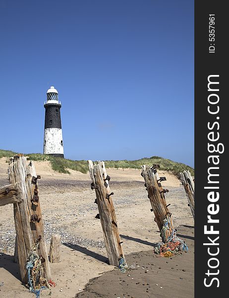 Black and white circular lighthouse at Spurn in East Yorkshire