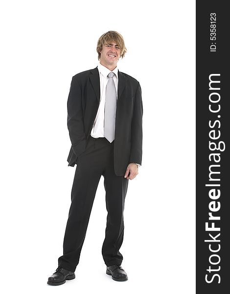 Portrait of a young businessman standing isolated on white