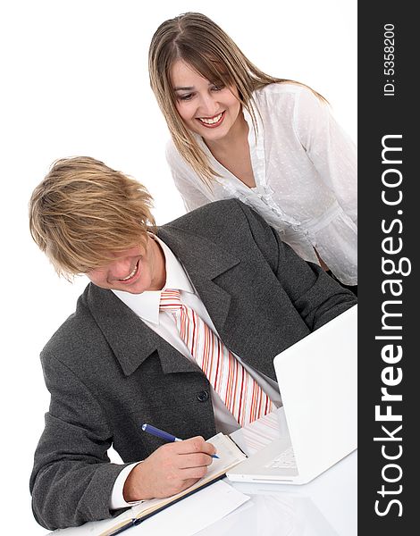 Young business team working on the desk over white