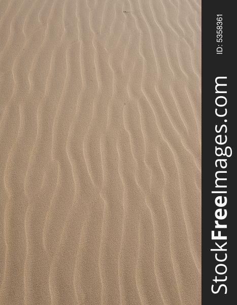 An image of an upclose sand dune. An image of an upclose sand dune
