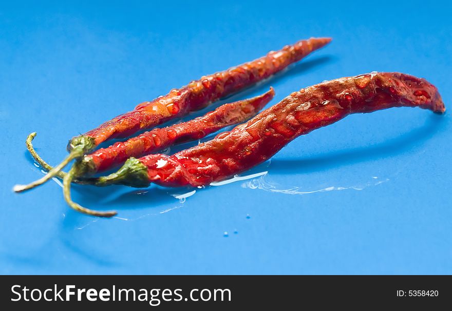 Dried red chili peppers sprinkled with water.