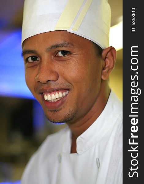 Photograph of asian chef close up