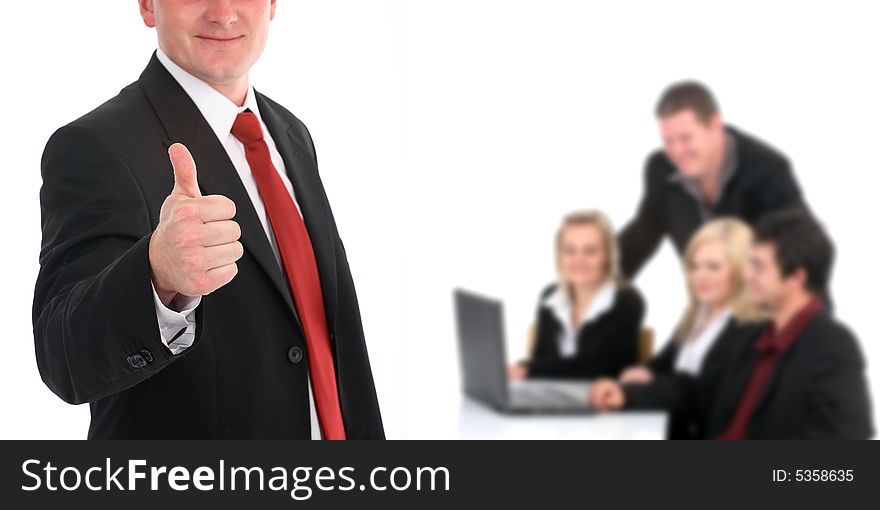 Portrait of a young attractive businessman giving the thumbs-up sign. Portrait of a young attractive businessman giving the thumbs-up sign.