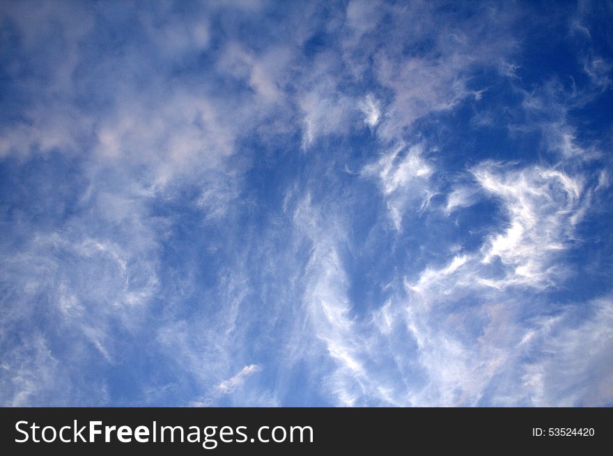 Sign of heart in the sky made by clouds