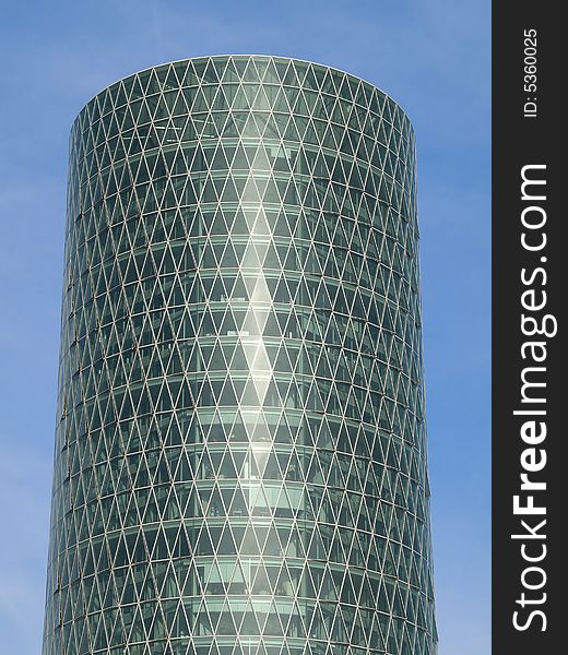 Glass front of an office building with sunlight reflections