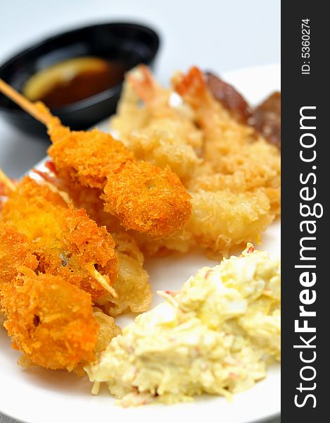 Japanese fried food served with egg salad. Japanese fried food served with egg salad