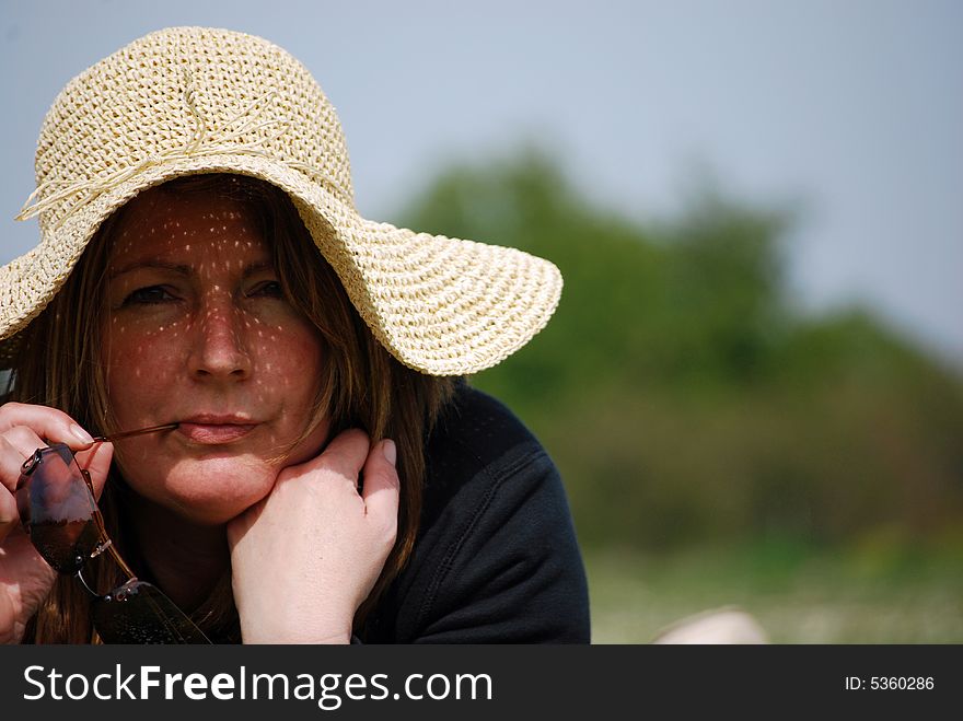 Shot of a woman relaxing in the summer