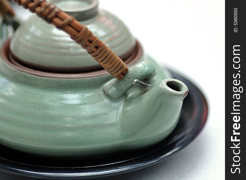 Japanese teapot on white background