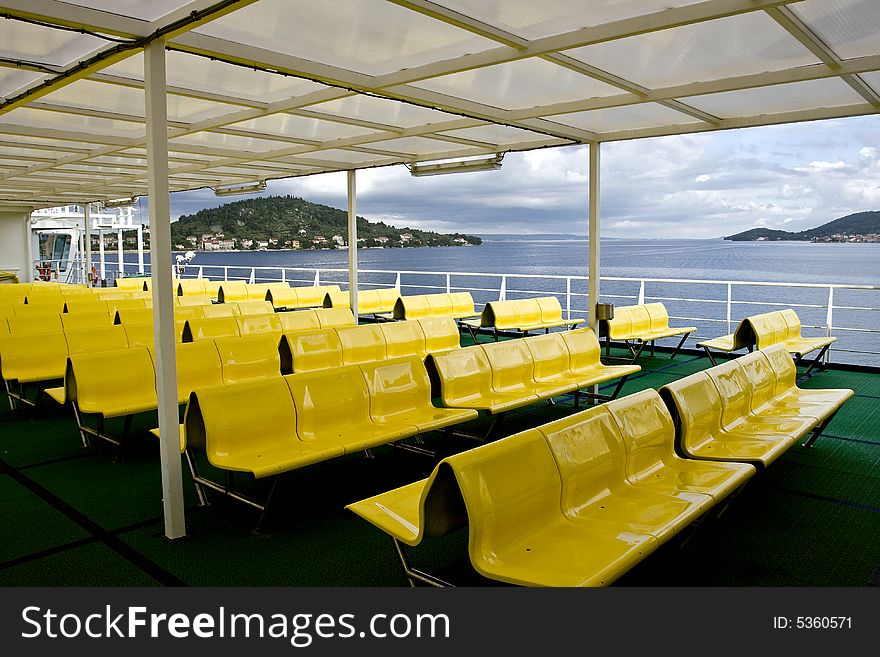 Seats on upper deck on the ferry from zadar to preko in croatia