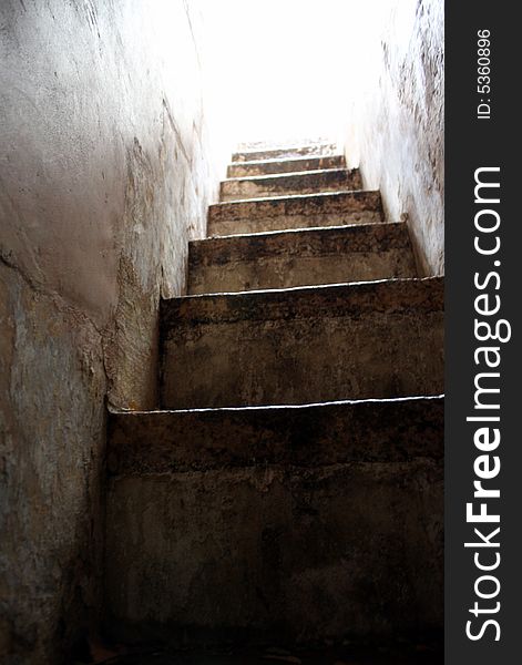 Ancient Stairs in Narrow Passageway