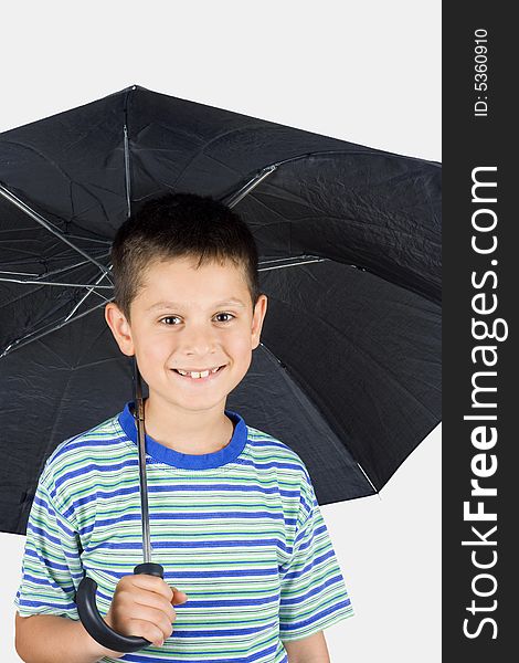 Young child under an umbrella on a white background. Young child under an umbrella on a white background