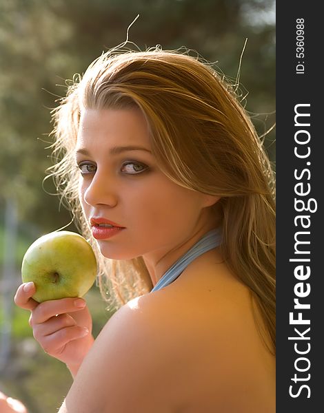 Girl With Apple On Sunset