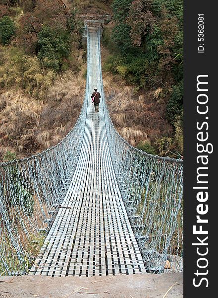 to cross a bridge in nepal