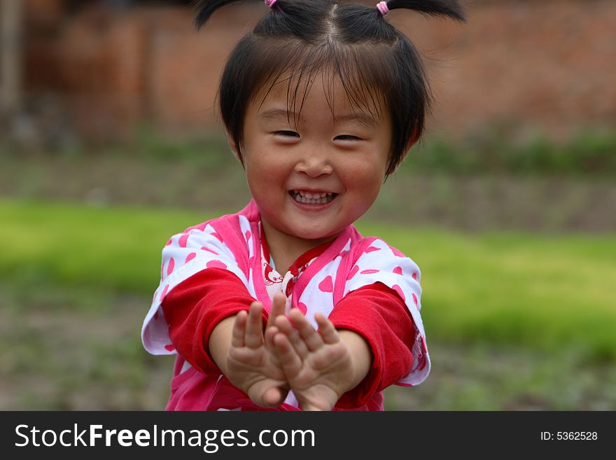 Cute little Chinese girl in summer