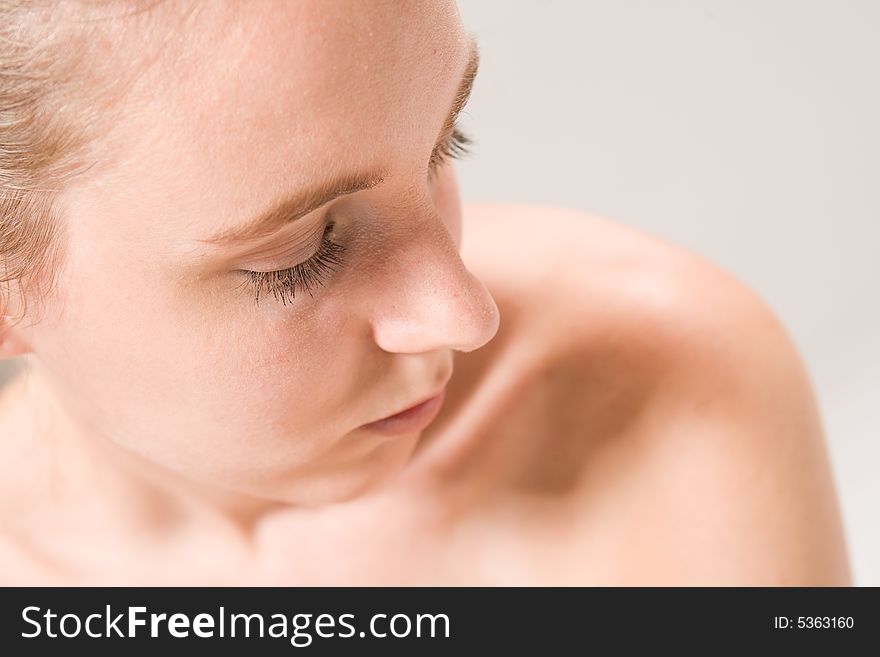 Studio close up portrait of a beautiful woman. Studio close up portrait of a beautiful woman