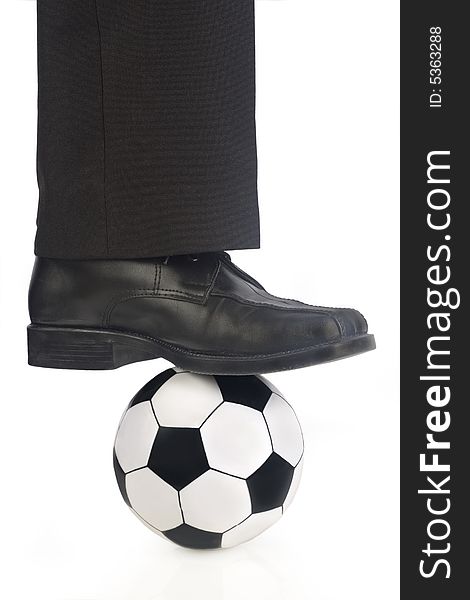 Isolated soccer ball and shoe