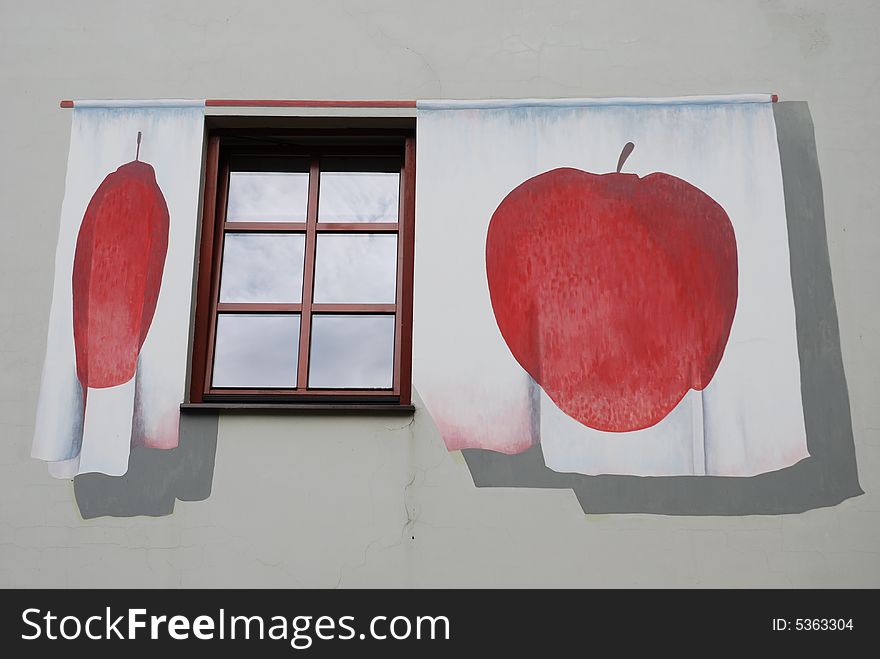 The window decorated with apples
