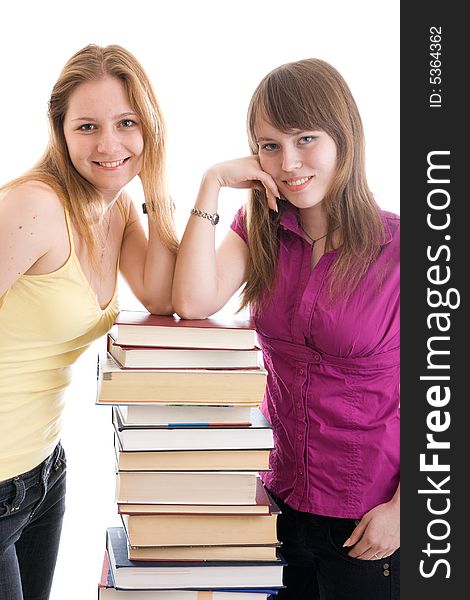 The two young students isolated on a white background