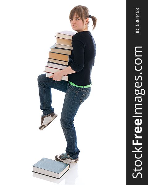 The young student with the book isolated on a white background. The young student with the book isolated on a white background