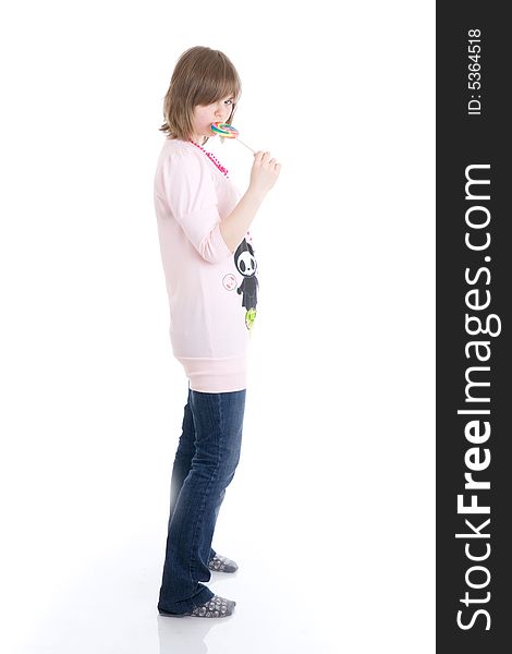 The girl with a sugar candy isolated on a white background