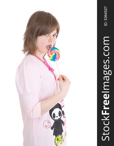 The girl with a sugar candy isolated on a white background