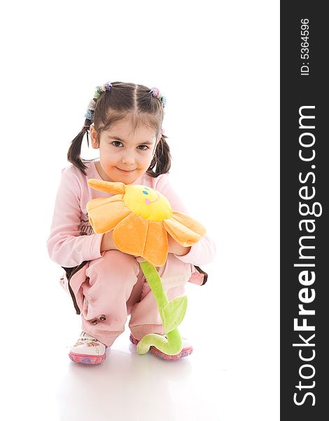 The young girl with flower isolated on a white