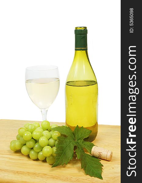 White wine with a bunch of grapes and vine leaf. White wine with a bunch of grapes and vine leaf