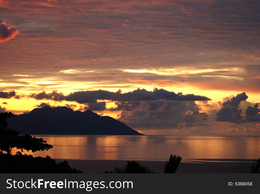 Sunset and  tropical island.