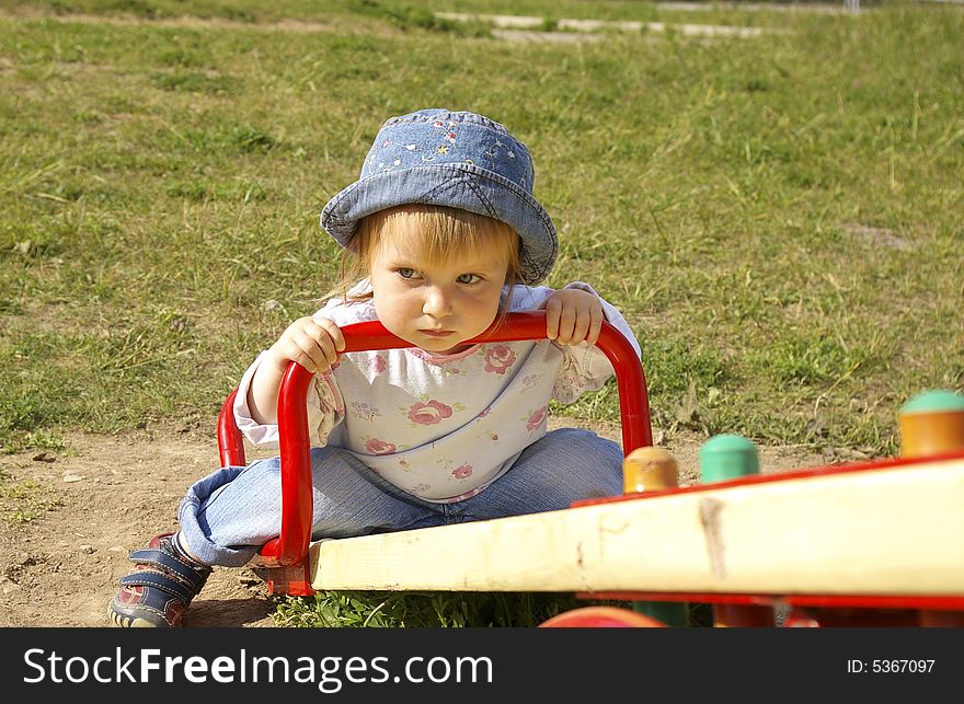 Girl swinging in the park