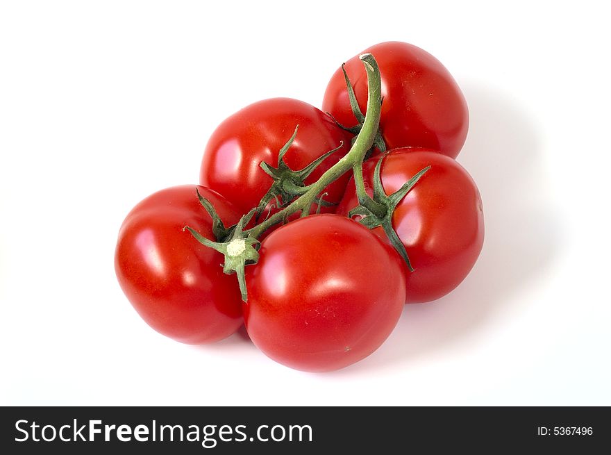 Red tomatoes isolated on white