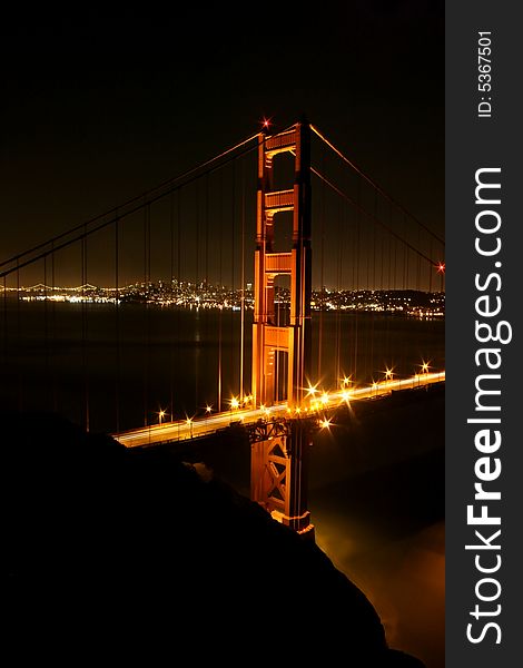 Golden Gate Bridge glows in lights. San Francisco, California, USA. Golden Gate Bridge glows in lights. San Francisco, California, USA