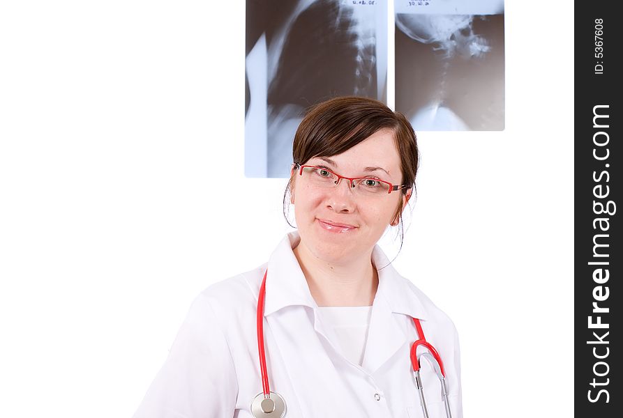 Young female doctor with 2 x-rays as background, isolated on white. Young female doctor with 2 x-rays as background, isolated on white