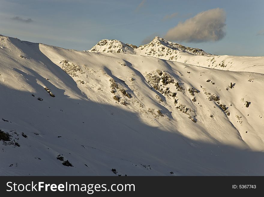 A photo of a Zillertal Alps taken from a ski-lift. The cloud really looked like volcano. A photo of a Zillertal Alps taken from a ski-lift. The cloud really looked like volcano..