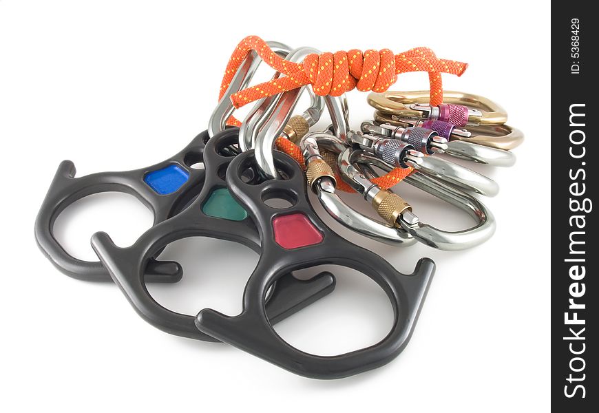 Photo of locking carabiners ,rope and rescue eight on white background. Photo of locking carabiners ,rope and rescue eight on white background.