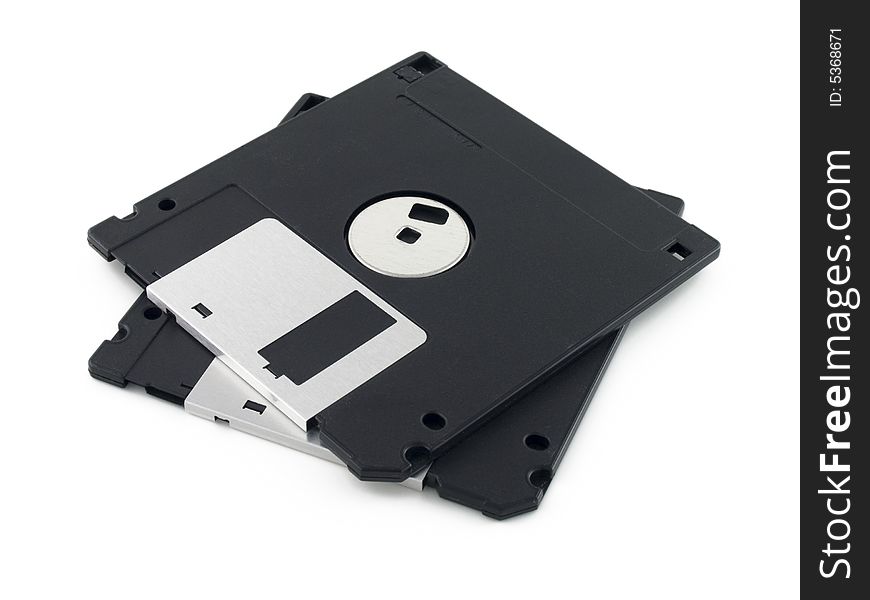 Photo of two black floppy disks on white background.