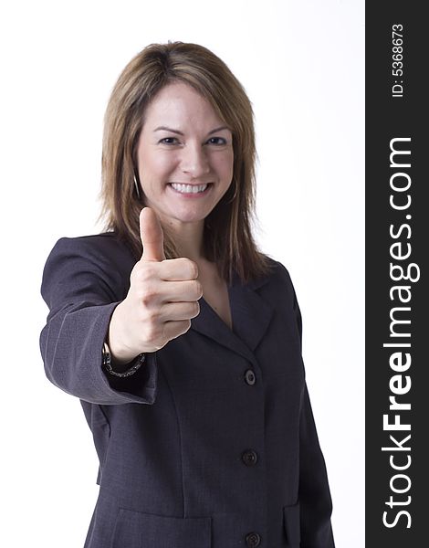 Businesswoman giving thumbs up isolated on white