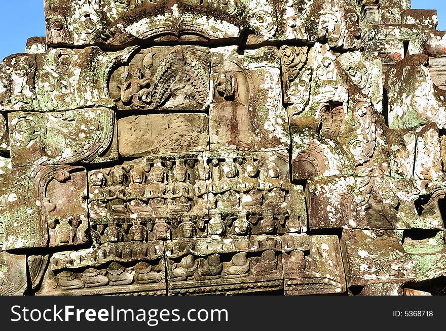 Cambodia, Angkor: The Preah Khan from 12th century it was a temple and a Buddhist university; the walls and pillars are decorated with mythological figures as this pediment